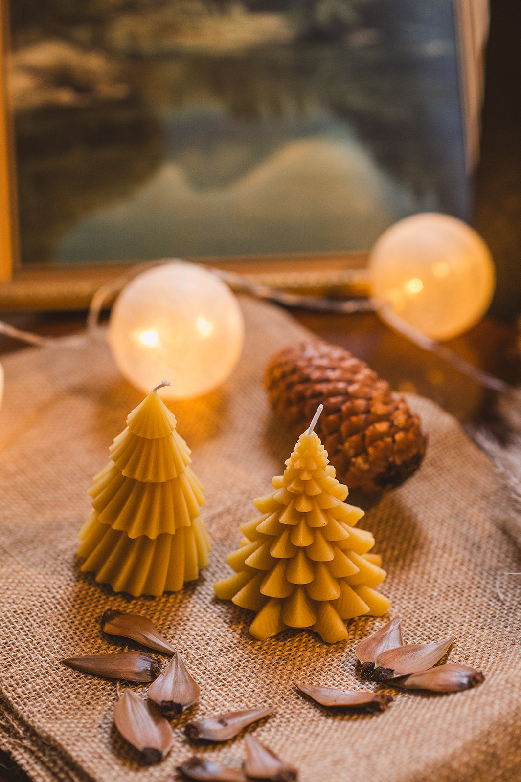 Beeswax Traditional Christmas Tree Candle with festive background