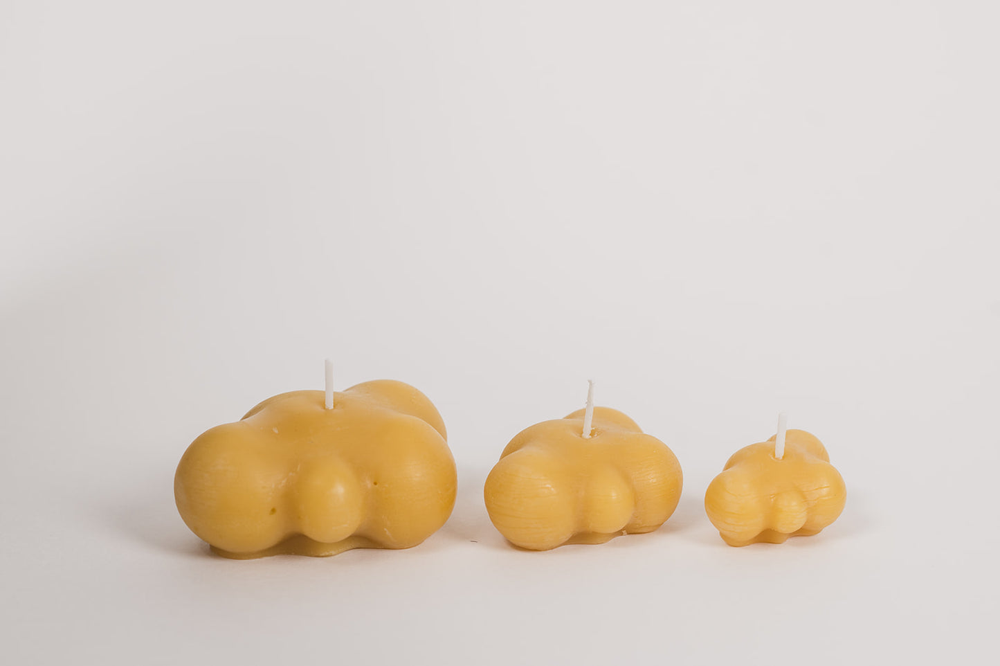 Three Cloud Beeswax Candles in a row